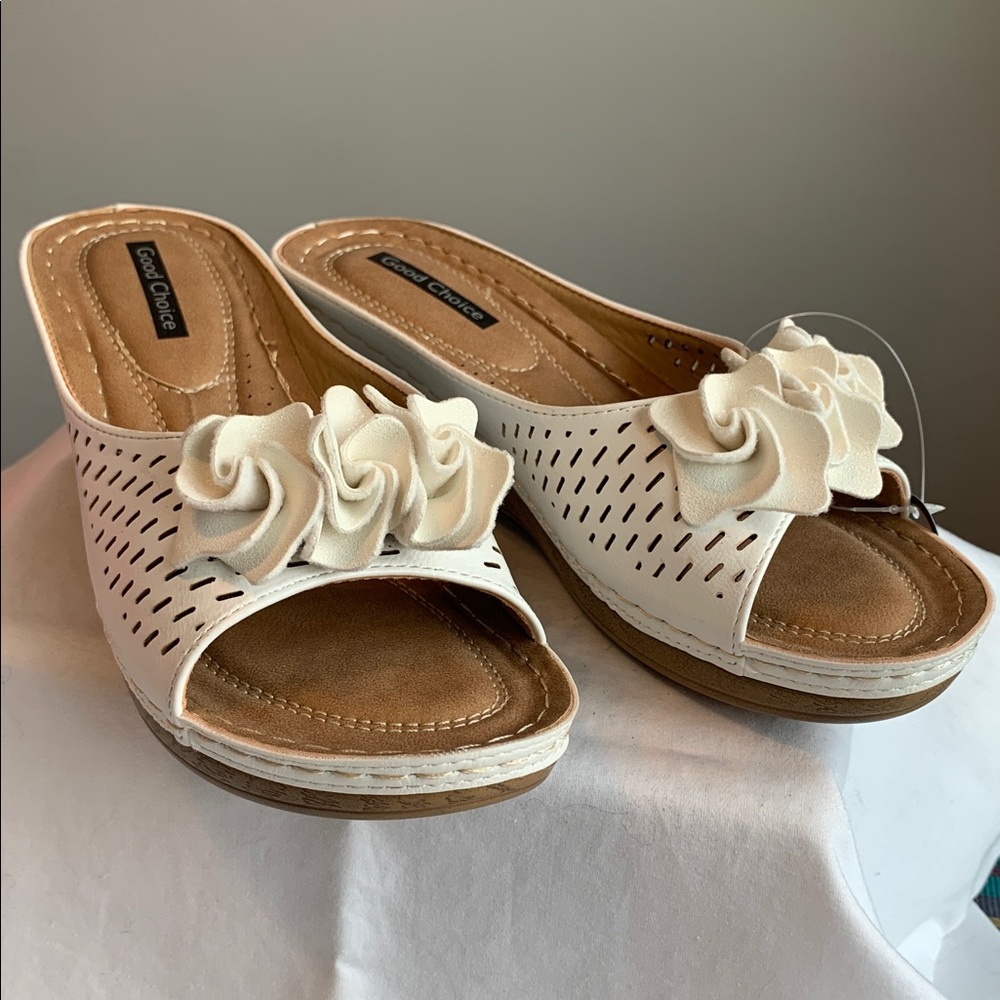 New “Juliet” Slip-On Sandals with Floral Accent